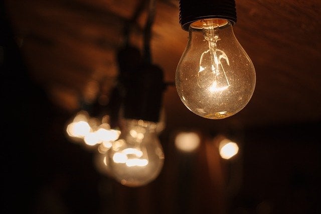 Bulbs glow in a dark room