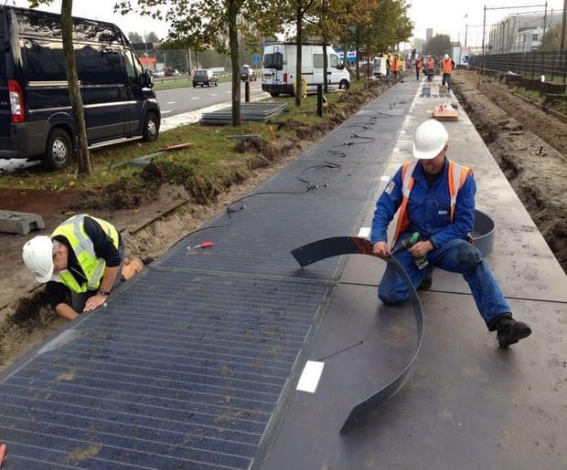 An engineer works on the Solaroad in Amsterdam